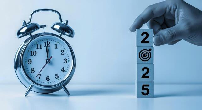 Countdown to 2025 Hand Placing Target Block Beside Clock, Symbolizing Goals and Time Management photo