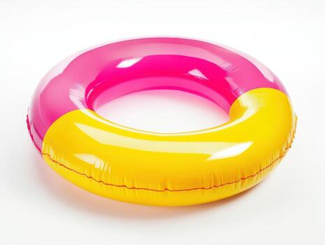 Inflatable ring with pink and yellow colors on a plain white surface view photo