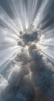 A sunbeam shines through the clouds in this image photo