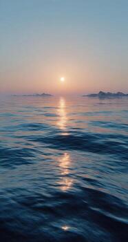 A sunset over the ocean with a boat in the distance photo