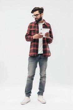 Software Developer Using Digital Tablet While Standing photo