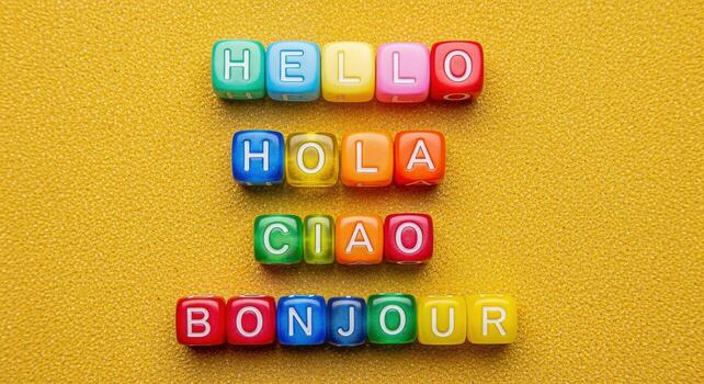 Multilingual Greetings Colorful Blocks Spelling Hello, Hola, Ciao, Bonjour on Textured Background photo