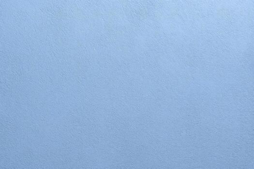 Soft Pastel Blue Textured Surface Ideal for Backgrounds, Wallpapers, and Graphic Design Projects, Demonstrating Simplicity and Subtlety photo