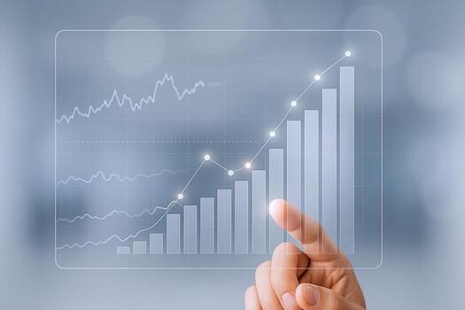 Financial Growth Chart with Hand Pointing to Increasing Graph on Digital Display Screen photo