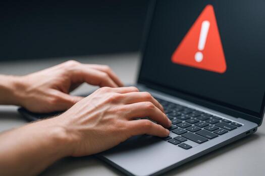 ordenador portátil mostrando un advertencia alerta con un persona mecanografía, simbolizando en línea seguridad riesgos y ciber amenazas foto