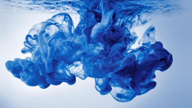 Blue Ink Cloud Expanding in Water, Abstract Motion Background, Serene and Artistic Underwater Composition photo