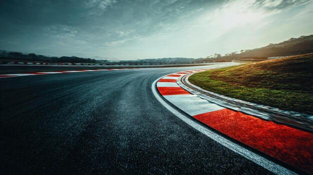 Dynamic Racing Track Curve Asphalt and Landscape Under Dramatic Sky, Ideal for Motorsports and Automotive Advertising photo