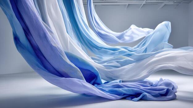 Abstract Flowing Fabrics in Shades of Blue and White Creating an Elegant and Dynamic Composition photo