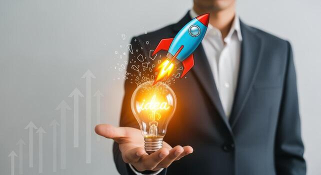 Innovative Concept Launch Businessman Presenting a Rocket Launching from a Light Bulb Idea in Hand photo