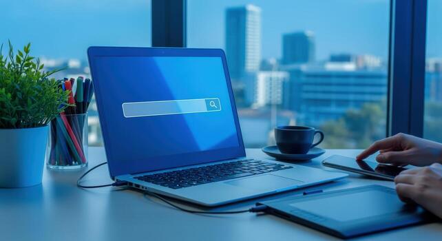 Workspace with Laptop, Tablet, and City View for Business and Technology Concepts photo