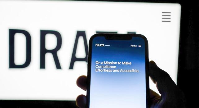 Compliance Software Solutions Displayed on Mobile Device and Monitor for Business Management and Regulatory Adherence photo