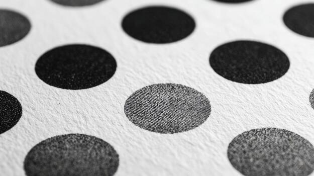 Monochrome Dotted Pattern on Textured White Surface Close-up, Featuring Circular Shapes and Simple Design photo
