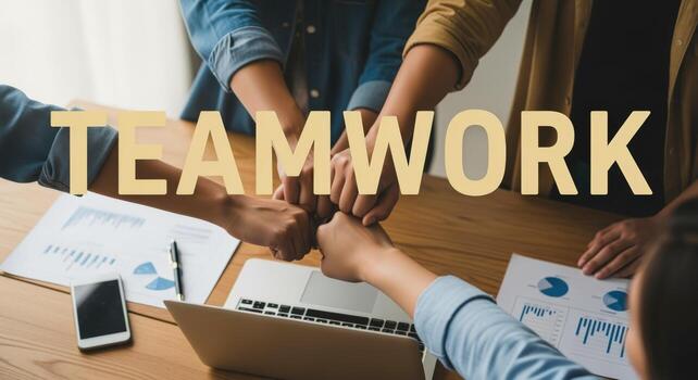 Diverse Team Hands Stacked in Collaboration Over Laptop and Reports, Symbolizing Unity and Corporate Success photo