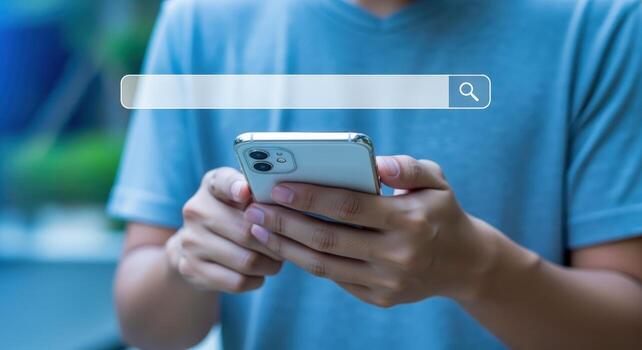 Man Holds Smartphone with Search Bar Overlay, Concept for Online Information and Web Browsing photo