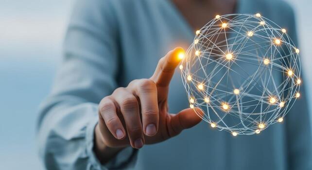 Global Network Connection Person Touching a Glowing Sphere Representing Technology and Digital Communication photo