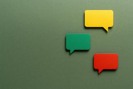 Three colorful speech bubbles on green background Communication, feedback, business, and social media concept photo