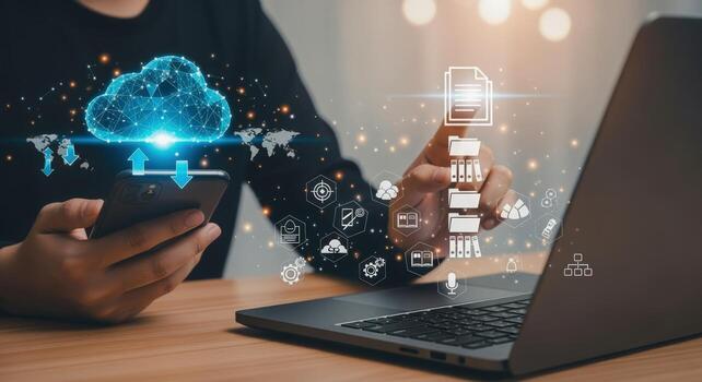 Cloud Computing and Data Management Businessman Using Mobile and Laptop to Access Digital Information photo