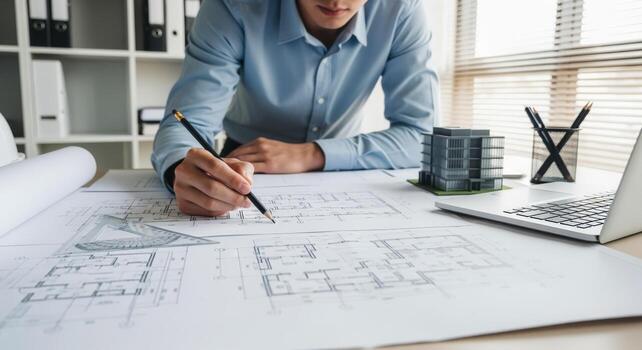 Architect Drawing Blueprint Plans in Office, Designing New Building Project with Technical Sketches photo