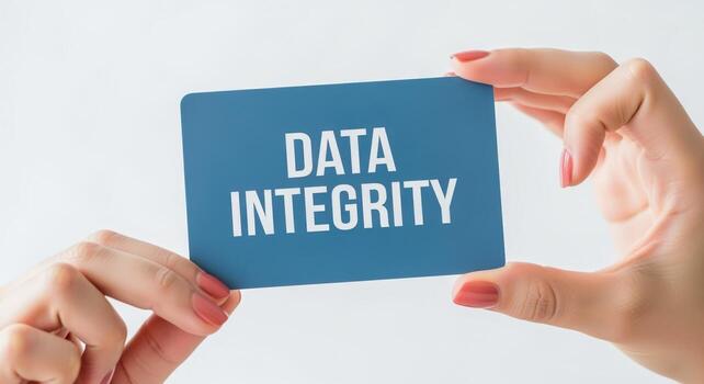 Hands Holding Data Integrity Card Illustrating Secure Information Management and Compliance for Business or Personal Use photo