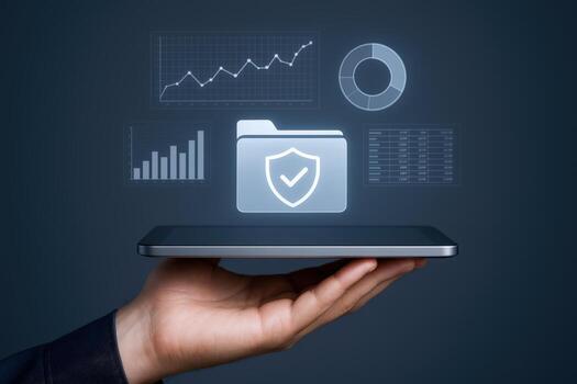 Data Protection Concept Man Holding Tablet with Secure Folder and Financial Analytics Overlay photo