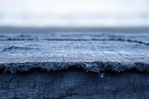 Textured fabric overview showcasing vibrant blue hues at a soft focus distance photo