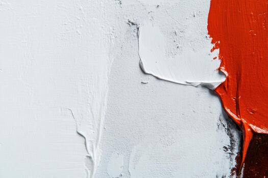 Abstract exploration of orange and white paint textures on canvas photo