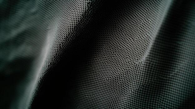 Close-up view of textured fabric showcasing intricate patterns in soft light photo