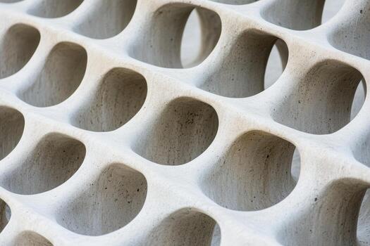 Unique architectural wall design showcasing hollow patterns in modern concrete photo