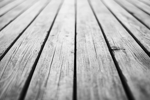 Wooden flooring with distinct grain patterns under soft light photo