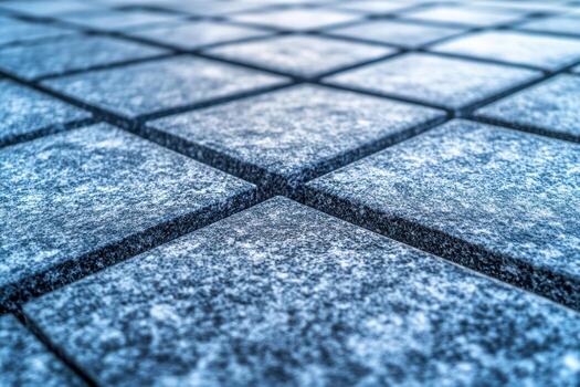 Textures of a stone pavement reflecting light on a cool day photo