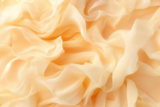 Delicate peach fabric draping elegantly, creating soft textures photo