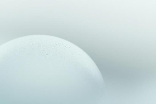 Soft light creates serene atmosphere with a blurred spherical object photo