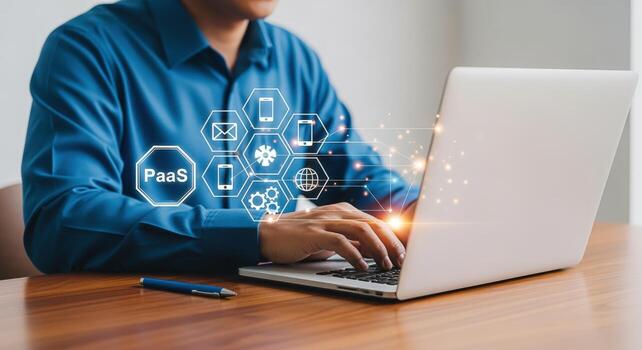 Platform as a Service Man Coding on Laptop with Abstract PaaS Icons and Modern Technology photo