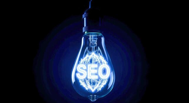 SEO concept represented in lightbulb with neon glow, conveying innovation, digital strategy and illumination photo