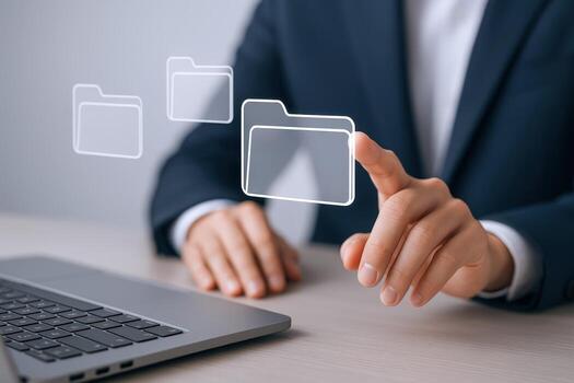 Businessman managing digital files, accessing cloud storage, and organizing documents through a virtual interface on laptop photo