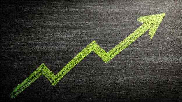 Green Arrow Chalkboard Growth, Success, and Positive Direction Visual for Business Concepts photo