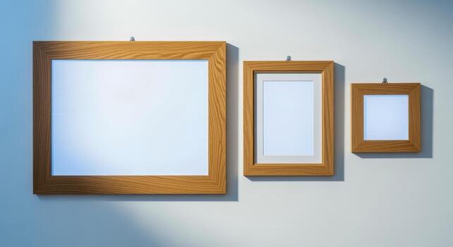 Three Wooden Picture Frames on Wall Customizable Mockups for Art, Photos, or Graphics Displays photo