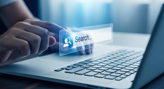 Online Search on Laptop with Finger Touching Screen Search Bar, Connectivity and Information Technology photo