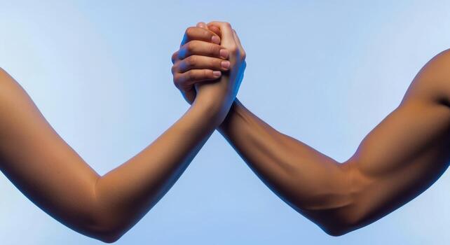 Arm Wrestling Competition with Two Opponents Clasping Hands in a Challenge of Strength and Power photo