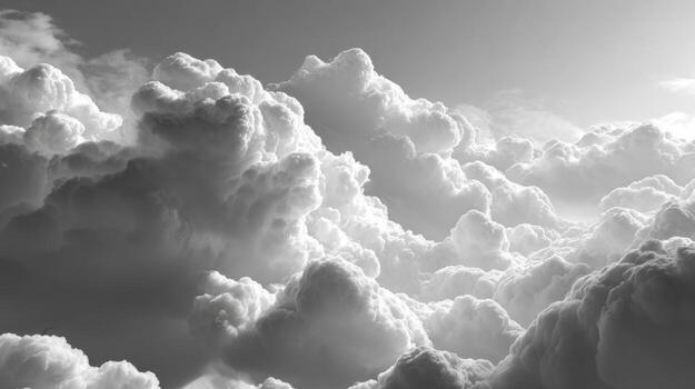 Dense clouds dominate the sky, creating an atmospheric display of shades of gray. The view captures the textured layers as they transition into twilight, evoking a sense of tranquility photo