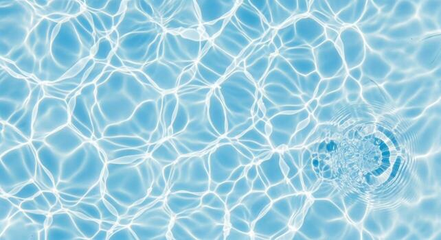 Light Blue Water Surface with Dynamic Ripple Patterns in Bright Natural Daylight photo