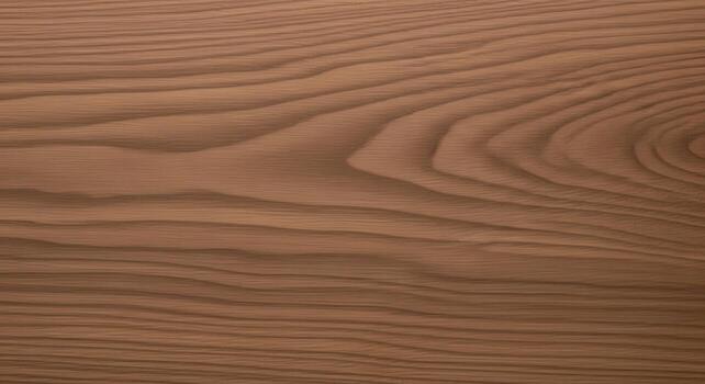 Close-up View of a Wood Grain Pattern with Swirling Lines and Warm Tones photo
