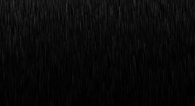 Abstract digital animation of heavy rain or falling particles creating a dynamic textured overlay on a deep black background, perfect for atmospheric visual effects, graphic design, and production photo