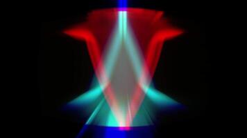 levande abstrakt former och färger sammanfoga i dynamisk visa på svart bakgrund video