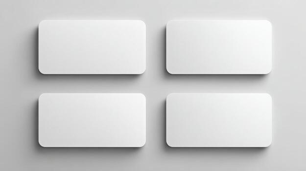 Four White Rounded Rectangles on a Seamless Gray Background for Text Overlays and Mockups photo