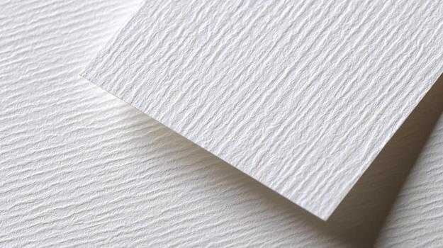 Close-up of Textured White Paper Surface, Ideal for Backgrounds and Mockups with Natural Pattern photo