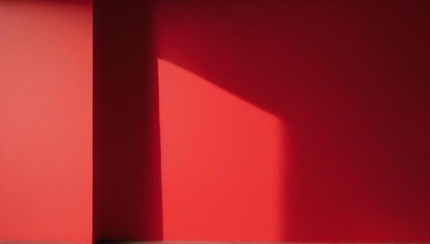 A red wall and a wooden floor in an empty room photo