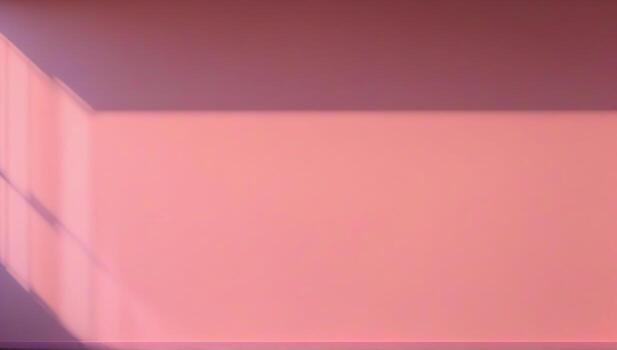 A pink wall with a window and a light shining on it photo