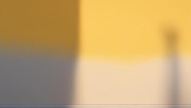 A yellow wall with a shadow of a person standing in front of it photo