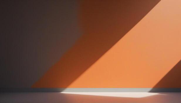 An orange wall with a light shining on it photo
